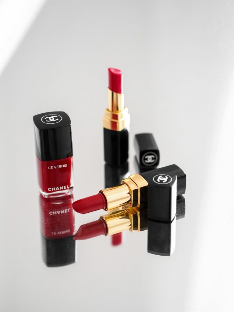 Red and black lipsticks arranged together on a flat surface