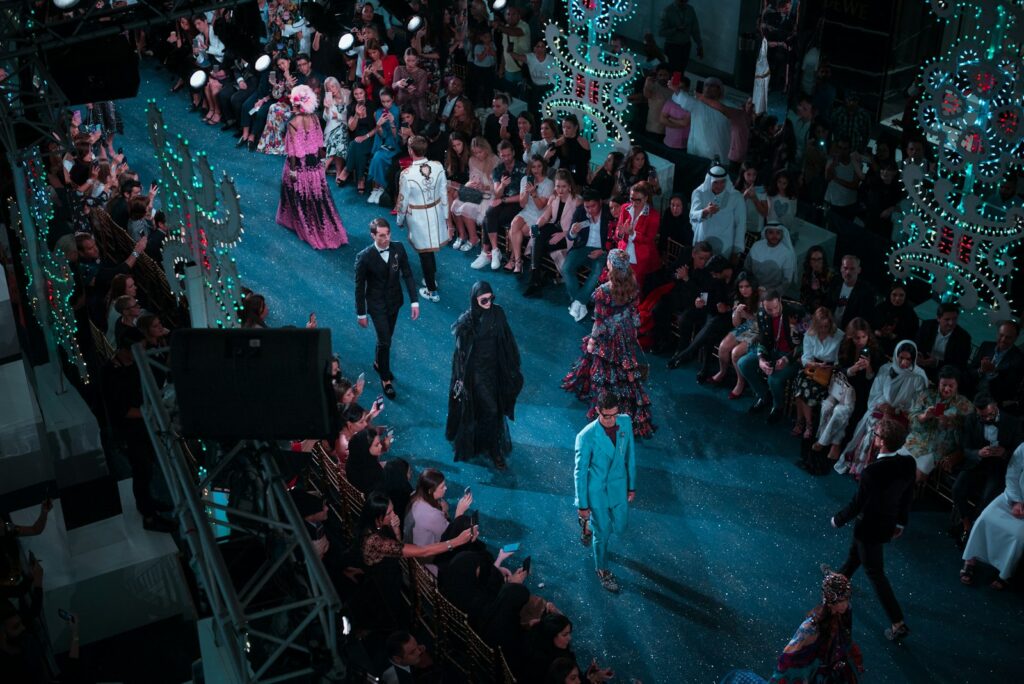 Fashion week model in clean tailored silhouette on the runway
