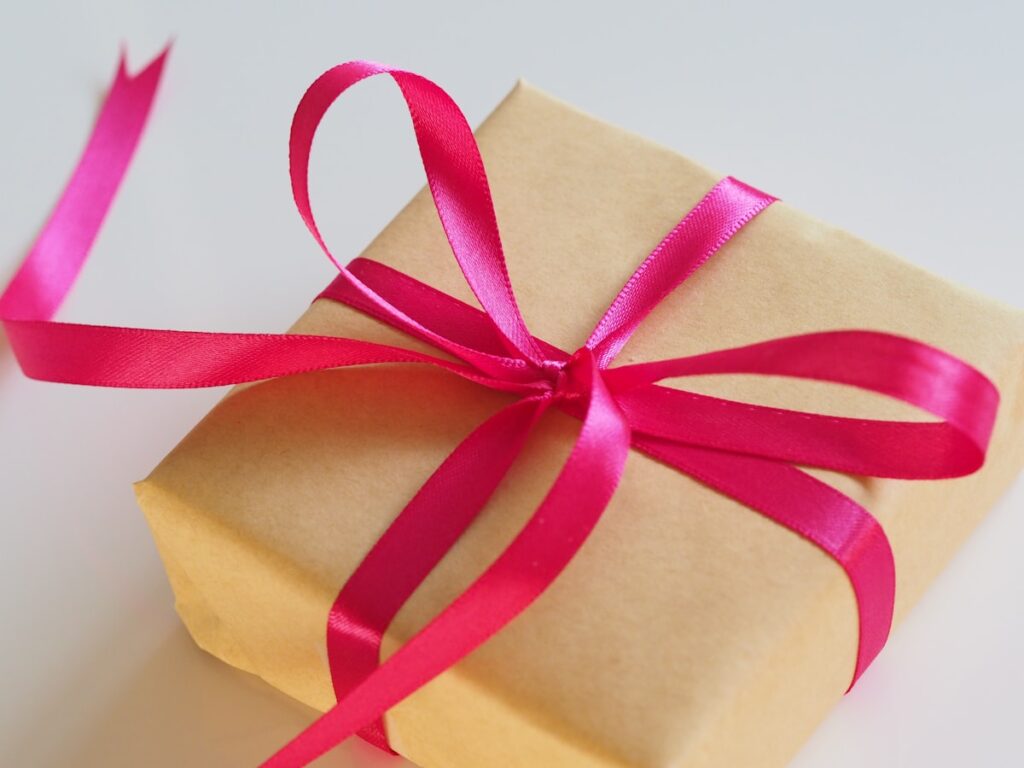 Gift box with pink ribbon