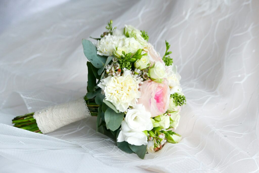 Spring florals on a soft white surface in natural light