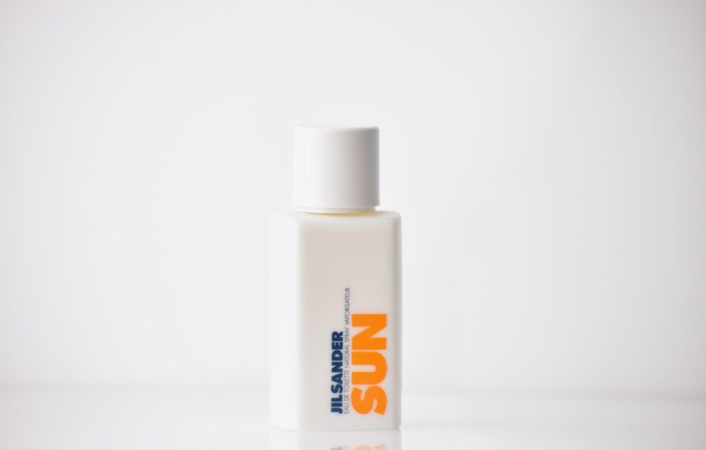 A blue and white bottle product photograph
