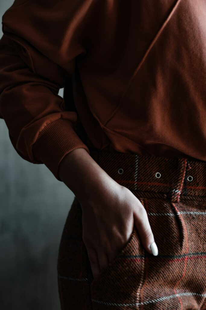 Autumn-toned beauty still life with brown leather