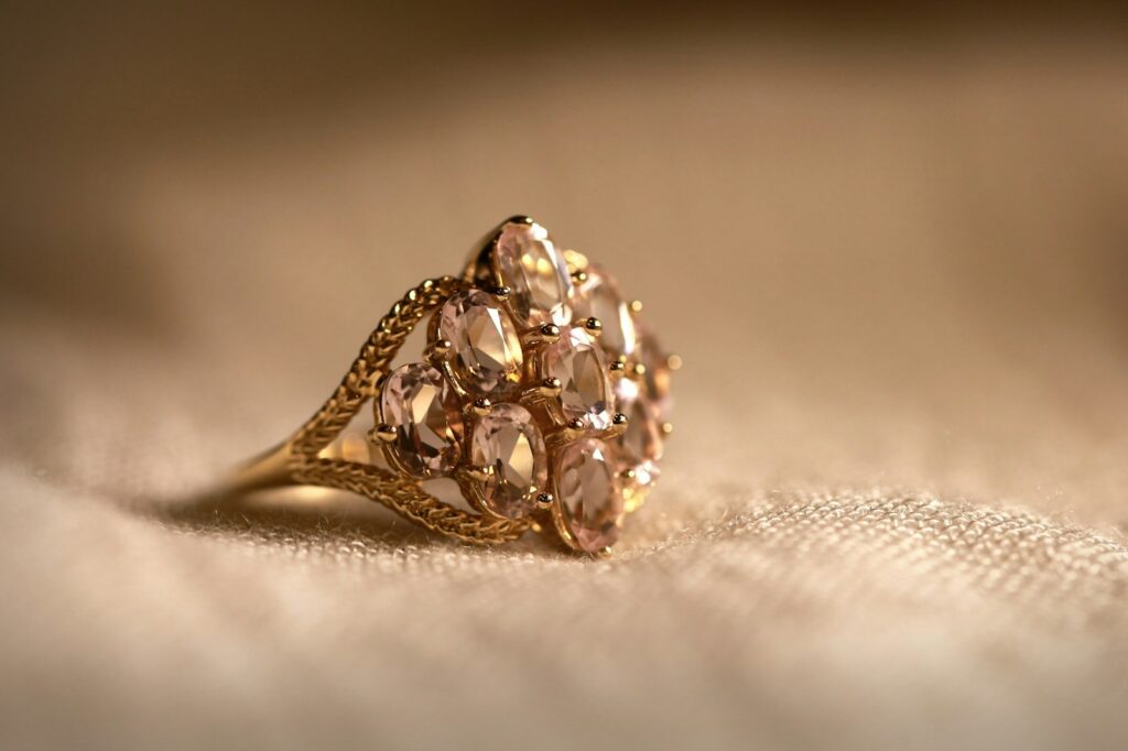 Fine jewellery flatlay in soft warm light