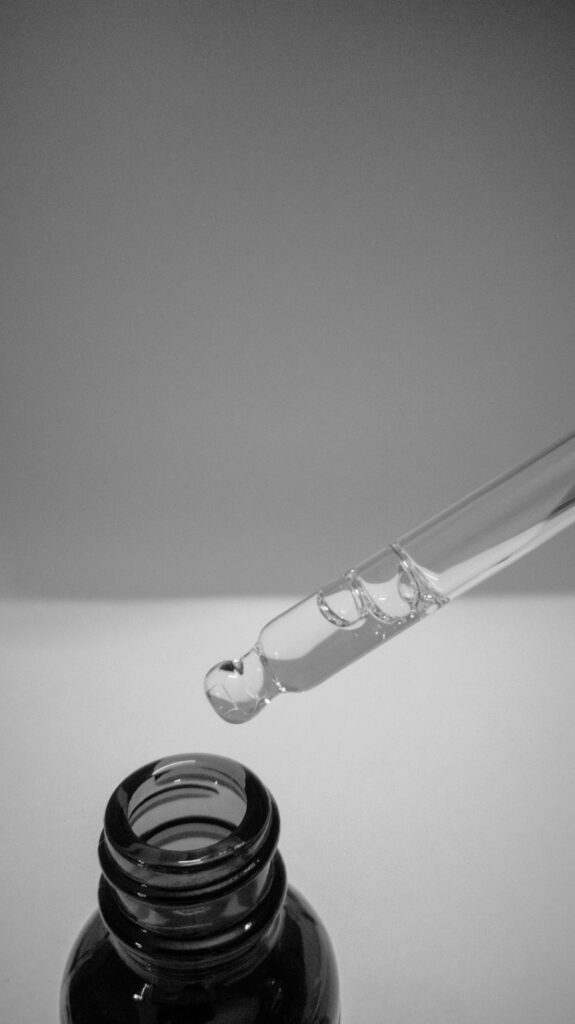 Skincare serum in glass bottle