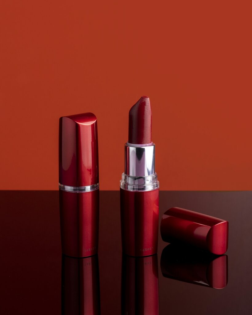 Red lipstick on a moody Valentine surface