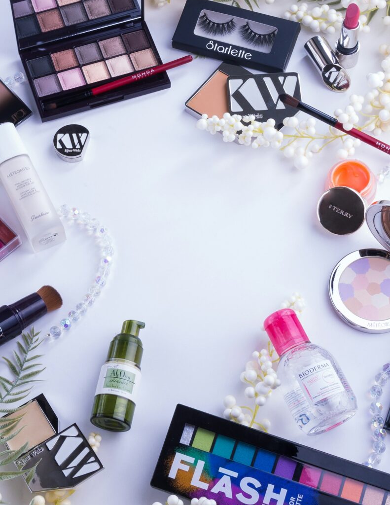 Holiday makeup and gift sets on a marble surface
